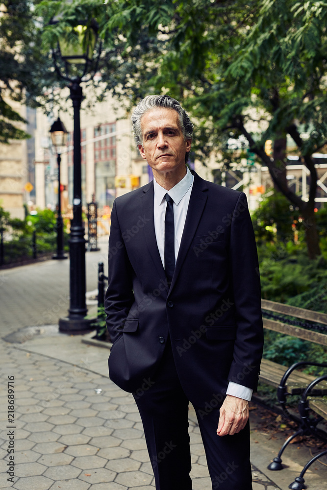 Grey Haired Caucasian Man Dressed in Contemporary Black Suit for Business, Executive Grey Haired Caucasian Man Dressed in Contemporary Black Suit for Business, Executive