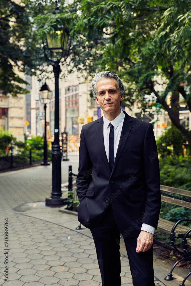Grey Haired Caucasian Man Dressed in Contemporary Black Suit for Business, Executive Grey Haired Caucasian Man Dressed in Contemporary Black Suit for Business, Executive