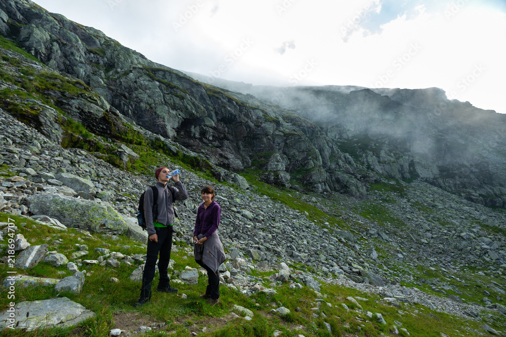 Young couple of hikers