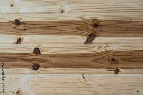 The natural color of unpainted wooden boards