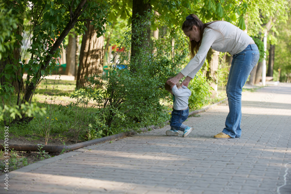 Grandma walks with her grandson Grandma walks with her grandson