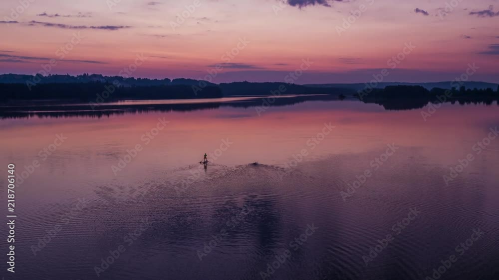 Triathlon swim training with stand-up paddler Triathlon swim training with stand-up paddler