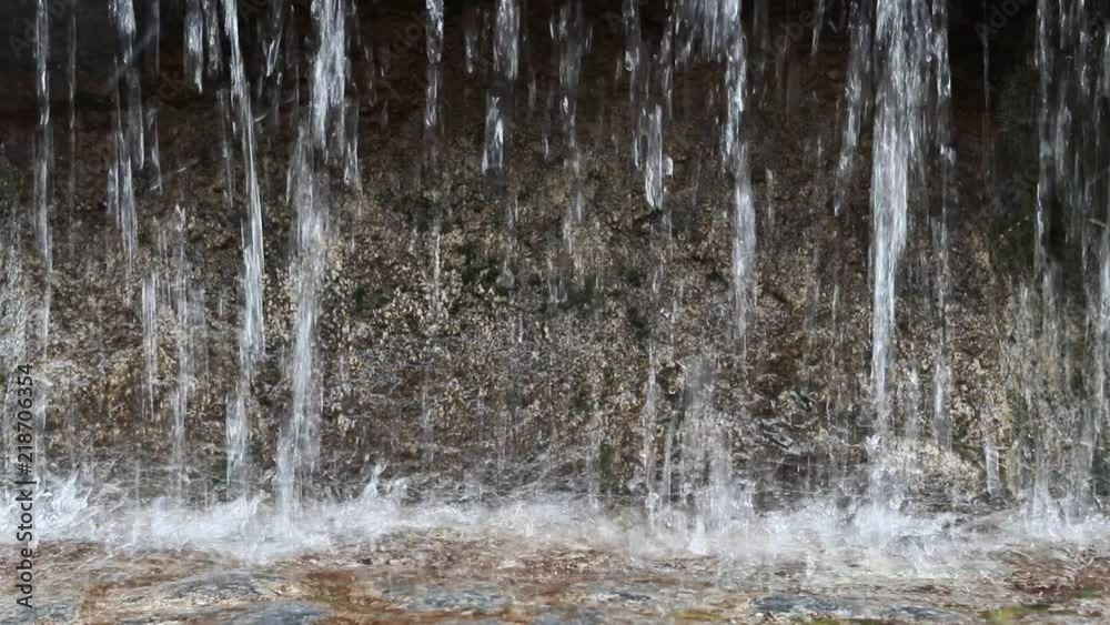 streams of fountain falling on surface of water streams of fountain falling on surface of water