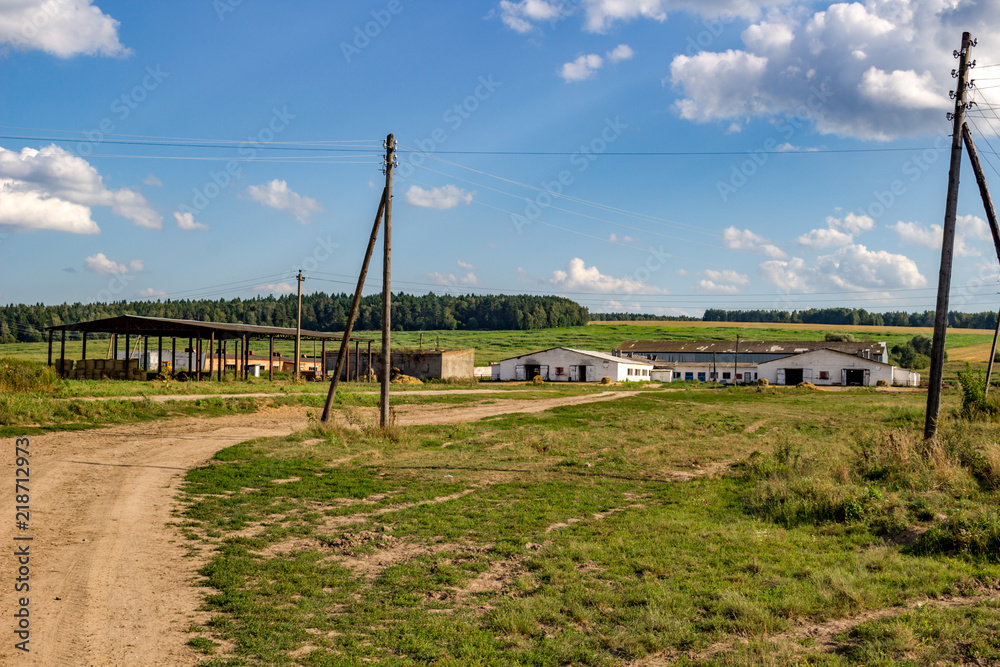 View of farm buildings in the countryside, village of Karaulovo. Kaluzhskiy region, Zhukovskiy district
View of farm buildings in the countryside, village of Karaulovo. Kaluzhskiy region, Zhukovskiy district