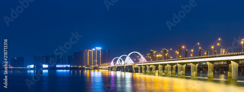 jiujiang night view of lake and bridge