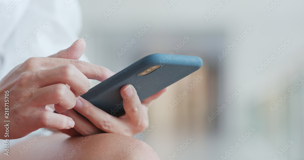 Close up of woman using mobile phone
