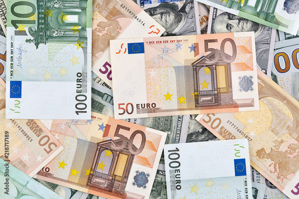 A lot of euro and american dollars banknotes. Background A lot of euro and american dollars banknotes. Background
