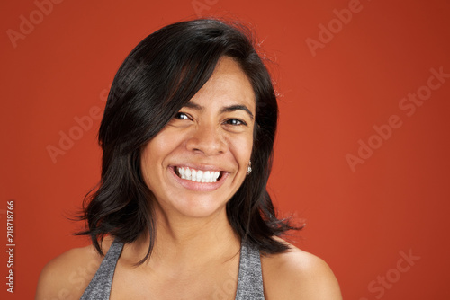 Happy smiling latina young woman portrait photo