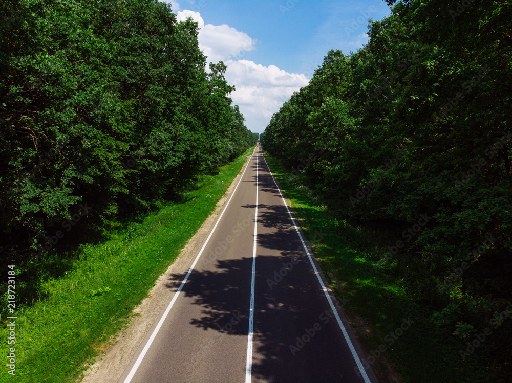 view of straight highway. sunny day. car travel concept