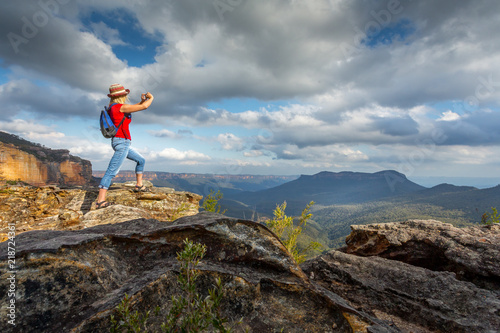 Tourist taking photos of stunning Blue Mountain vistas