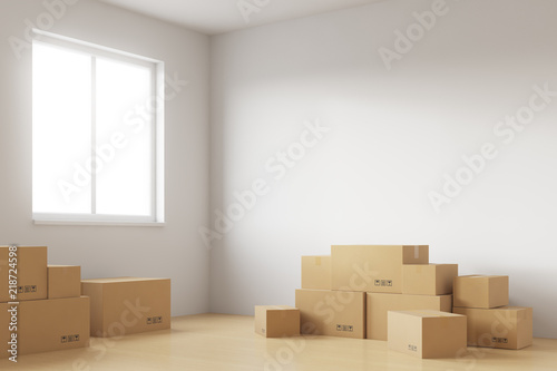 Empty office, new house full of cardboard boxes. The light outside the window. 3d rendering