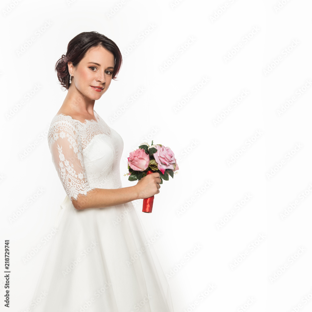 elegant bride on a light background. Beautiful wedding bouquet in a bride hands. free space for your text elegant bride on a light background. Beautiful wedding bouquet in a bride hands. free space for your text