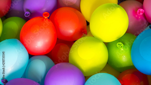 Many bright and colorful water balloons