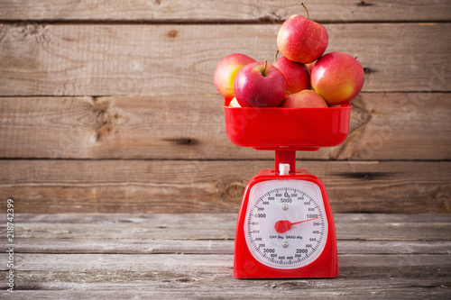 apples on red scales