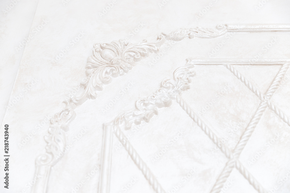 Close-up details of interior skirting ceiling of white color, classic style Close-up details of interior skirting ceiling of white color, classic style