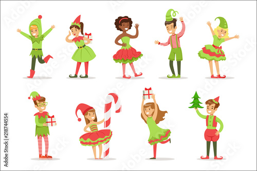 Children Dressed As Santa Claus Christmas Elves For The Costume Holiday Carnival Party