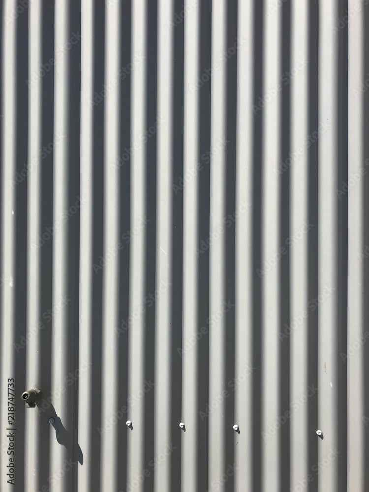 white gray painted corrugated zinc metallic sheet board fence texture  pattern on house wall surface background. Detail backdrop, abstract design,  interior and exterior architecture concept Stock Photo | Adobe Stock