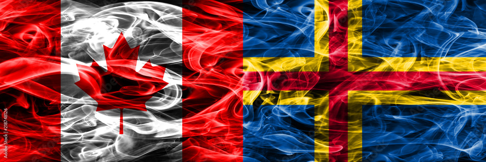 Obraz premium Canada vs Aland smoke flags placed side by side. Canadian and Aland flag together