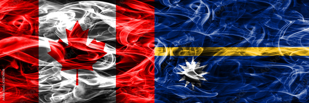 Obraz premium Canada vs Nauru smoke flags placed side by side. Canadian and Nauru flag together