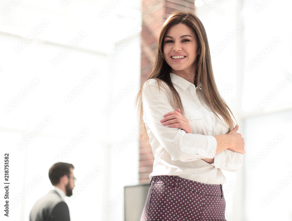 modern business woman on blurred office background modern business woman on blurred office background
