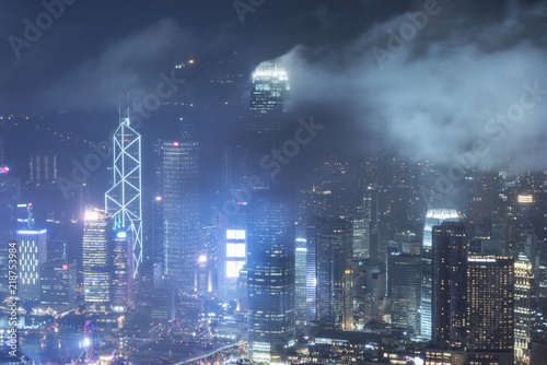 Skyline of Hong Kong city in mist at night