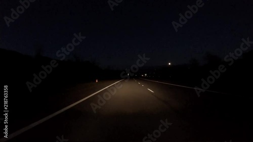 Driving on the motorway at night on Anglesey - Wales photo
