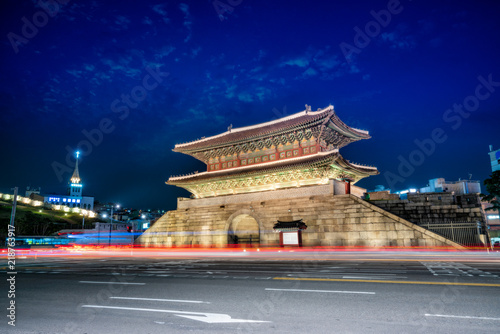 Dongdaemun Gate at night with light trails of Traffic in Seoul city, South Korea