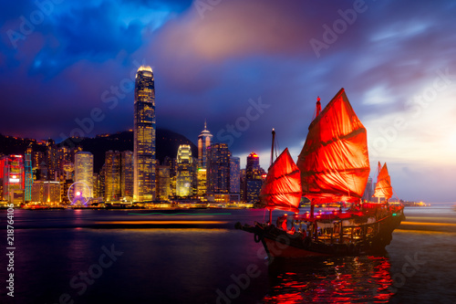 Canvas Print Hong Kong City skyline with tourist sailboat at night