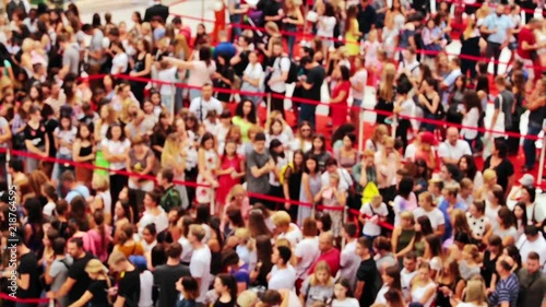 Black friday. A lot of people are queued at the mall store. Blurred video.