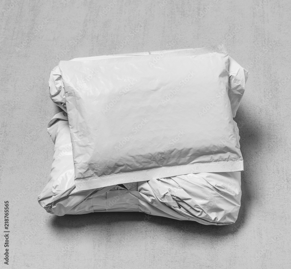 Obraz premium post parcels from Chinese stores close-up with copy space, top view black and white photo