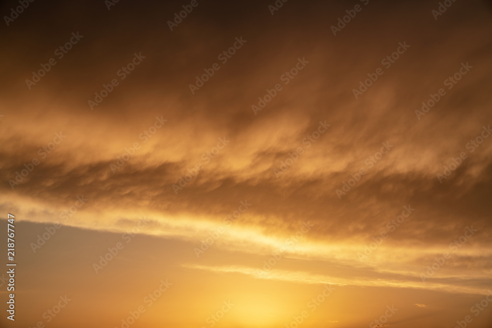 Dramatic golden sky at the sunrise background