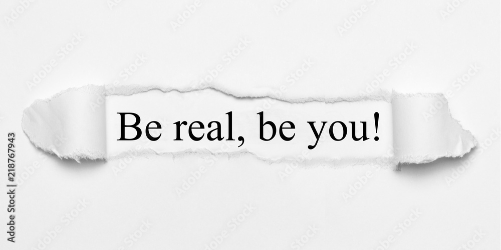 Obraz premium Be real, be you! on white torn paper