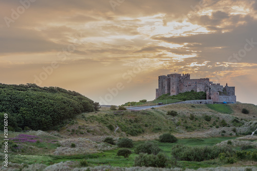 bamburgh castle with dramatic sky