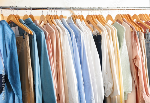 Rack with women clothes in modern store