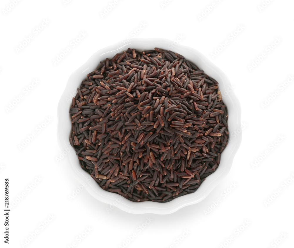 Bowl with black wild rice on white background