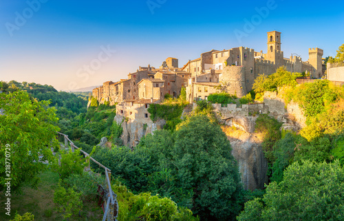 Panorama of the medieval town of Viturchiano located on the edge of the cliff, at sunset, Lazio. Italy. Europe photo