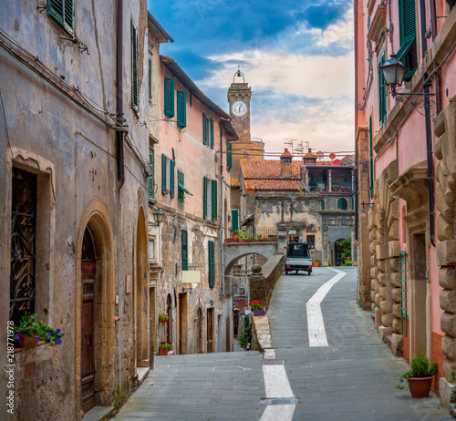 A beautiful street in a medieval town in Tuscany at sunset. Sorano. Italy © Tortuga