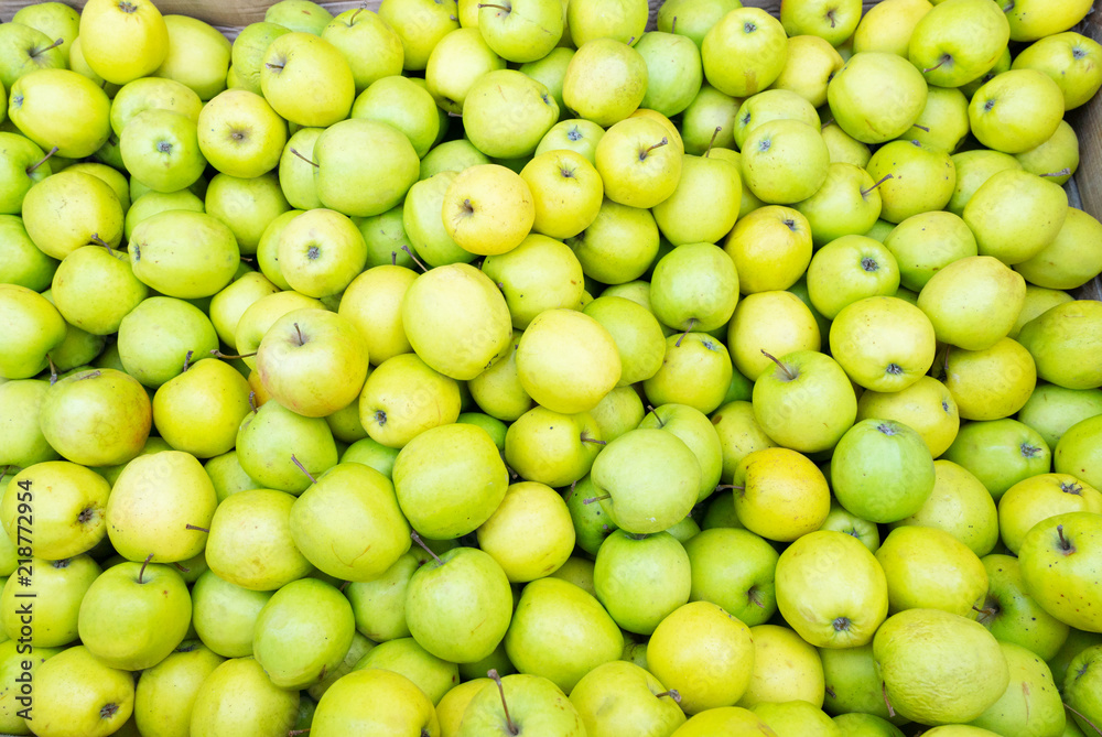 green apples background in box at street market green apples background in box at street market