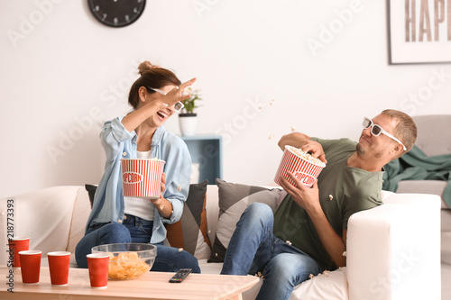 Couple having fun while eat...