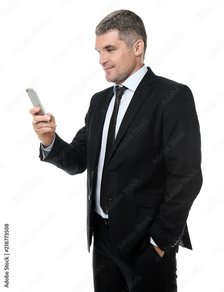 Handsome confident businessman with mobile phone on white background Handsome confident businessman with mobile phone on white background