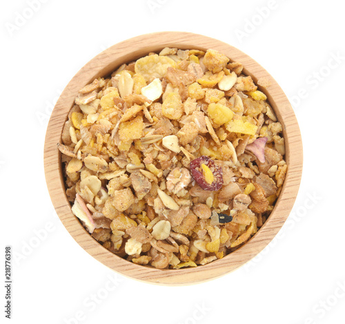 Cereal in a wooden bowl on white background.