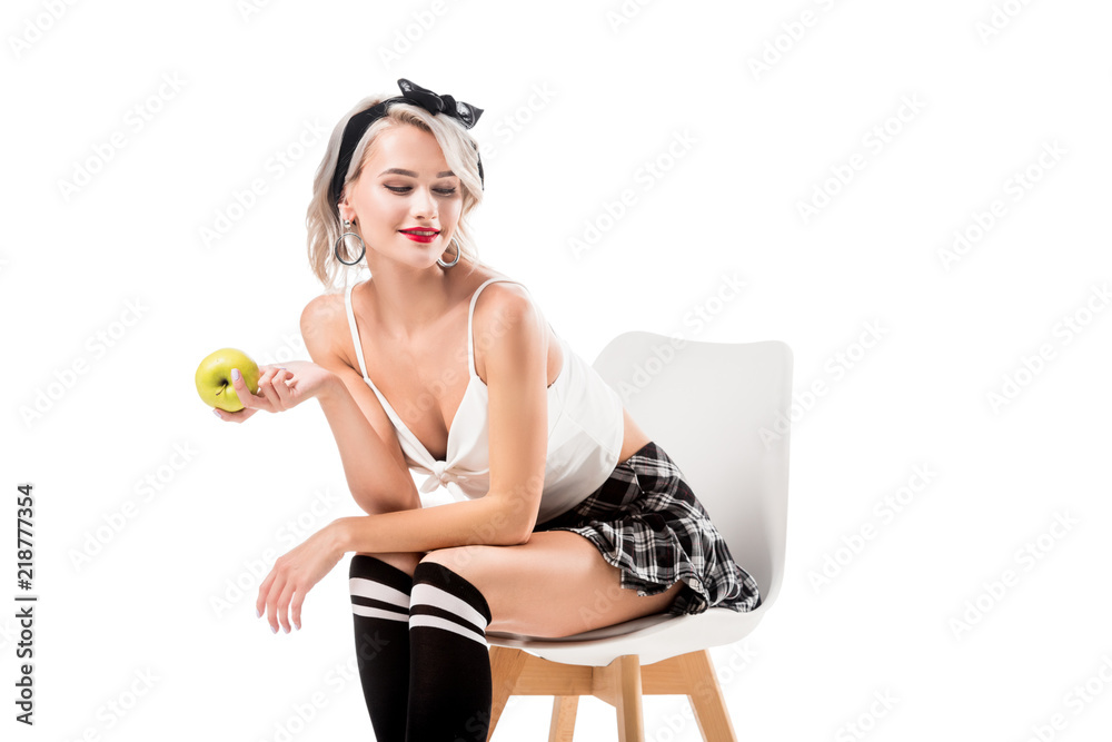 young sexy woman in short plaid skirt and knee socks with apple in hand  sitting on chair isolated on white foto de Stock | Adobe Stock