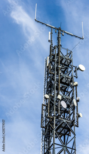 Antenna mast with many satellite shots, parabolants and directional antennas for listening, transmitting and monitoring