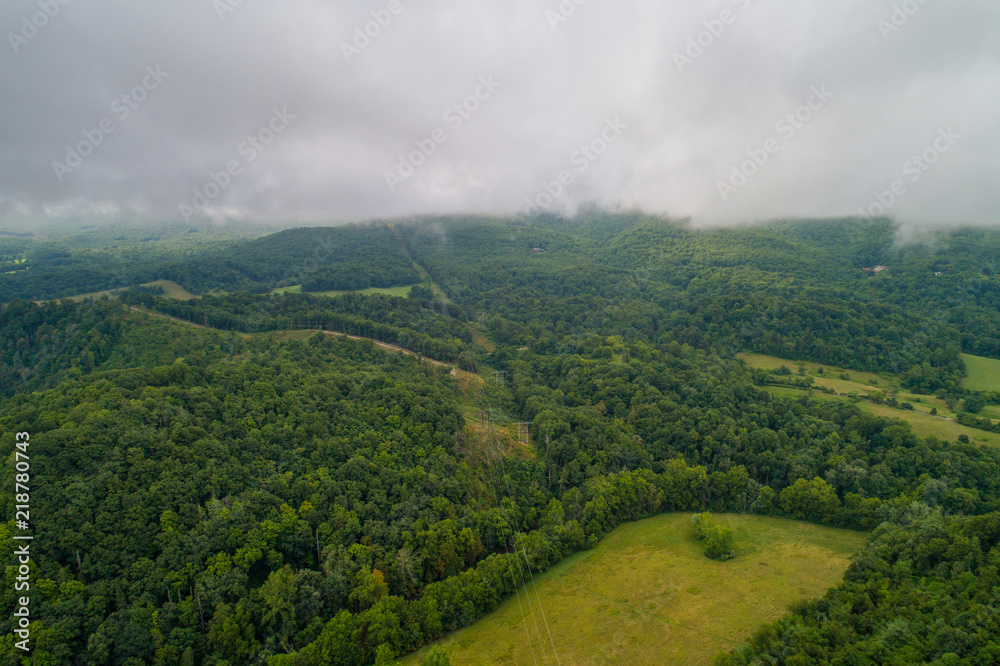 Aerial photo of Wytheville Virginia USA green farmland with low storm clouds