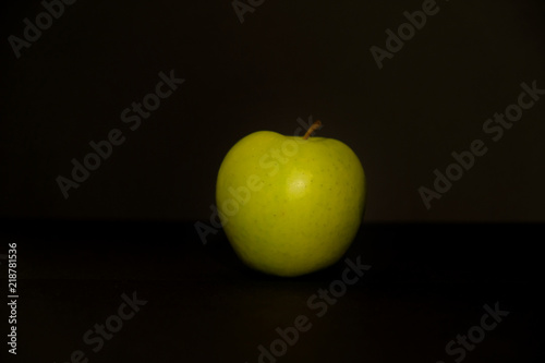Apple on black background