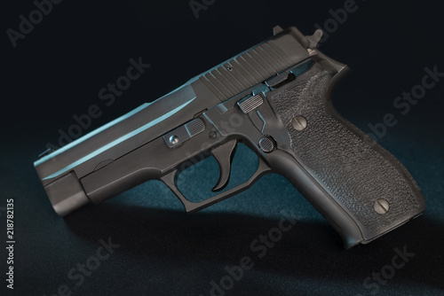 Black 9mm semiautomatic pistol handgun.