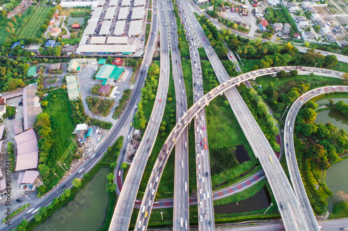 Intersection infinity sign traffic road with car and green park pond