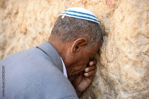 Religious Jews pray at the Western Wall in Jerusalem. Prayer of the Coens in honor of the Jewish holiday Pesach photo