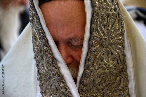 Religious Jews pray at the Western Wall in Jerusalem. Prayer of the Coens in honor of the Jewish holiday Pesach