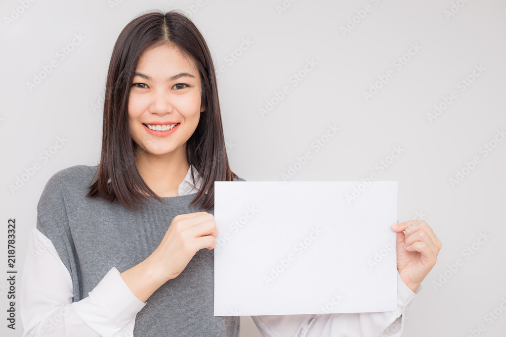 Beautiful asian women hold white blank paper advertising Beautiful asian women hold white blank paper advertising